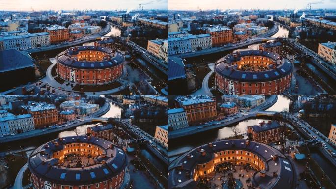 圣彼得堡的新荷兰岛。圆形的古代欧洲砖砌建筑的鸟瞰图。城市景观4k飞行。全景几何结构