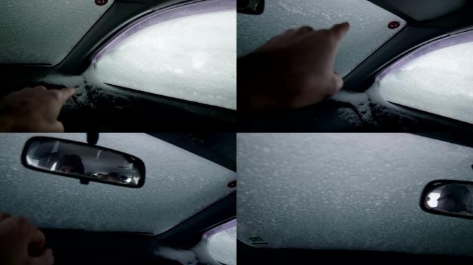 汽车视点。睡在车里。在冰雪覆盖的道路上行驶，第一场雪落下。