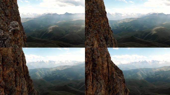 日落时无人机飞过尖锐的岩石露头的特写鸟瞰图。用于极端登山的陡峭的岩层山。飞行穿越旅行视频