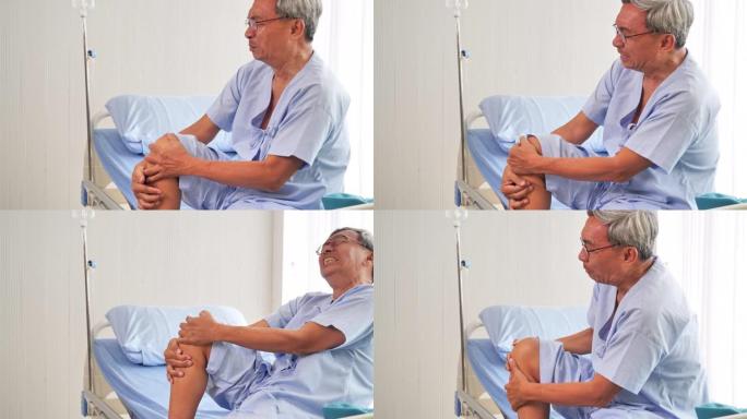 患者资深亚裔男子在医院病床上感到剧烈疼痛。