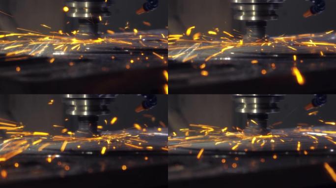 工业激光机切割钢板零件。热。工厂生产机器运行过程中的火花。运动模糊。