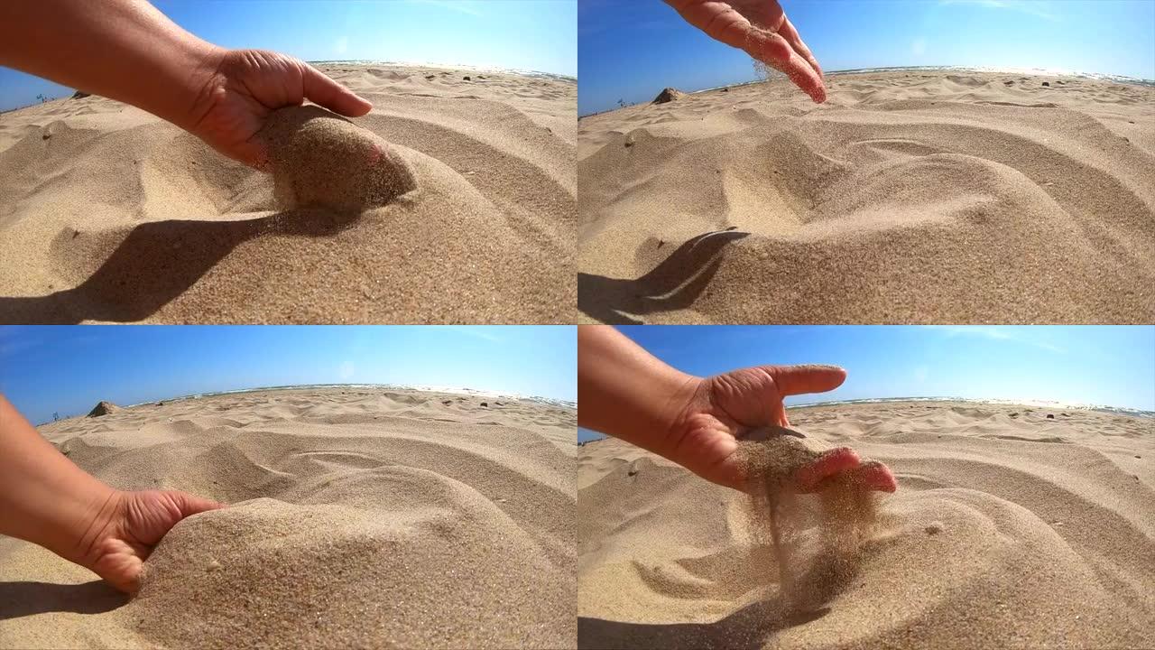 慢动作。女孩拿起手掌上的沙子撒上