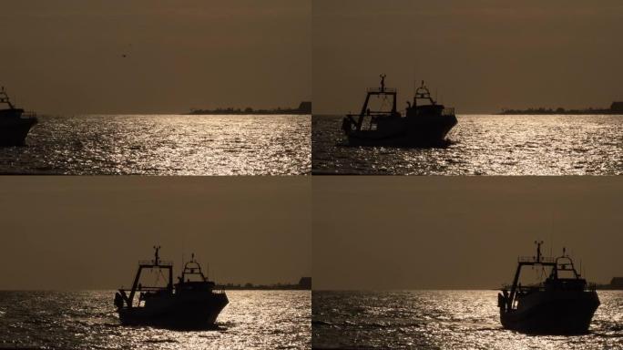 日落时航行的渔民船