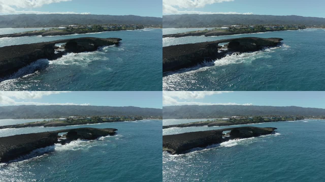 夏威夷瓦胡岛Laie point的带有海拱的小岛的无人机观点