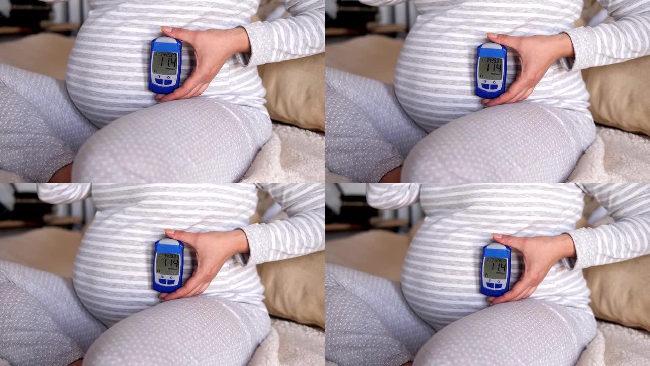 怀孕女孩显示血糖仪测定糖水平结果高