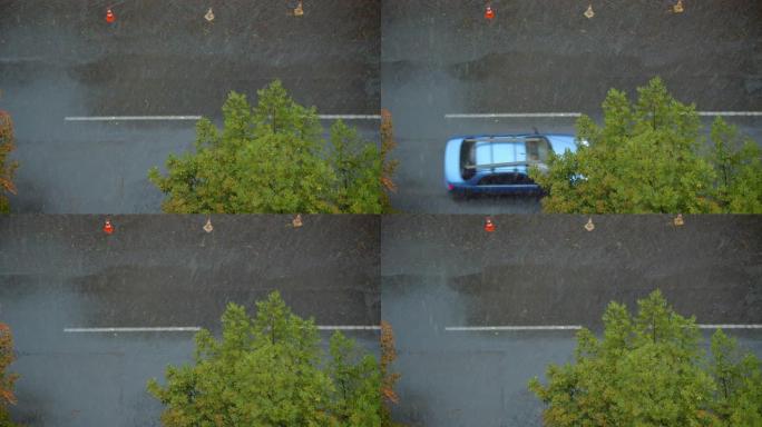 夏季白天在城市街道上下雨的窗口顶部拍摄