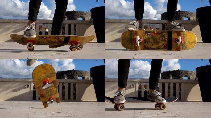 滑板运动员的特写镜头在慢动作跳跃中做360的kickflip heelflip技巧