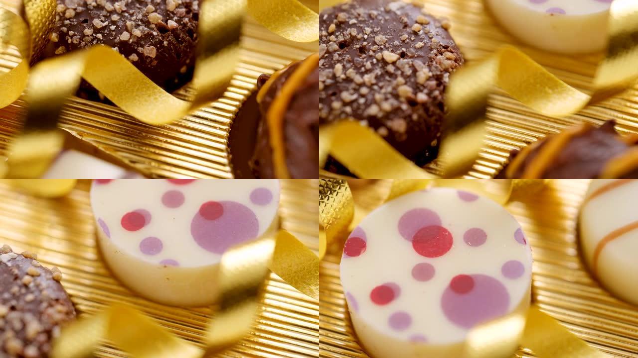 美食巧克力糖果在金色背景上特写-滑过镜头