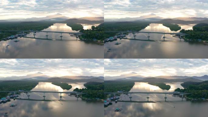 马来西亚沙巴州蒙卡河图阿兰美丽日出风景的空中4k镜头。