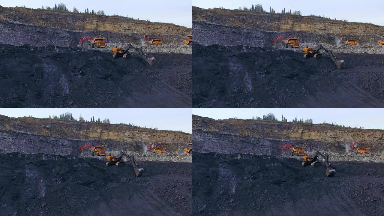 黄色挖掘机挖煤