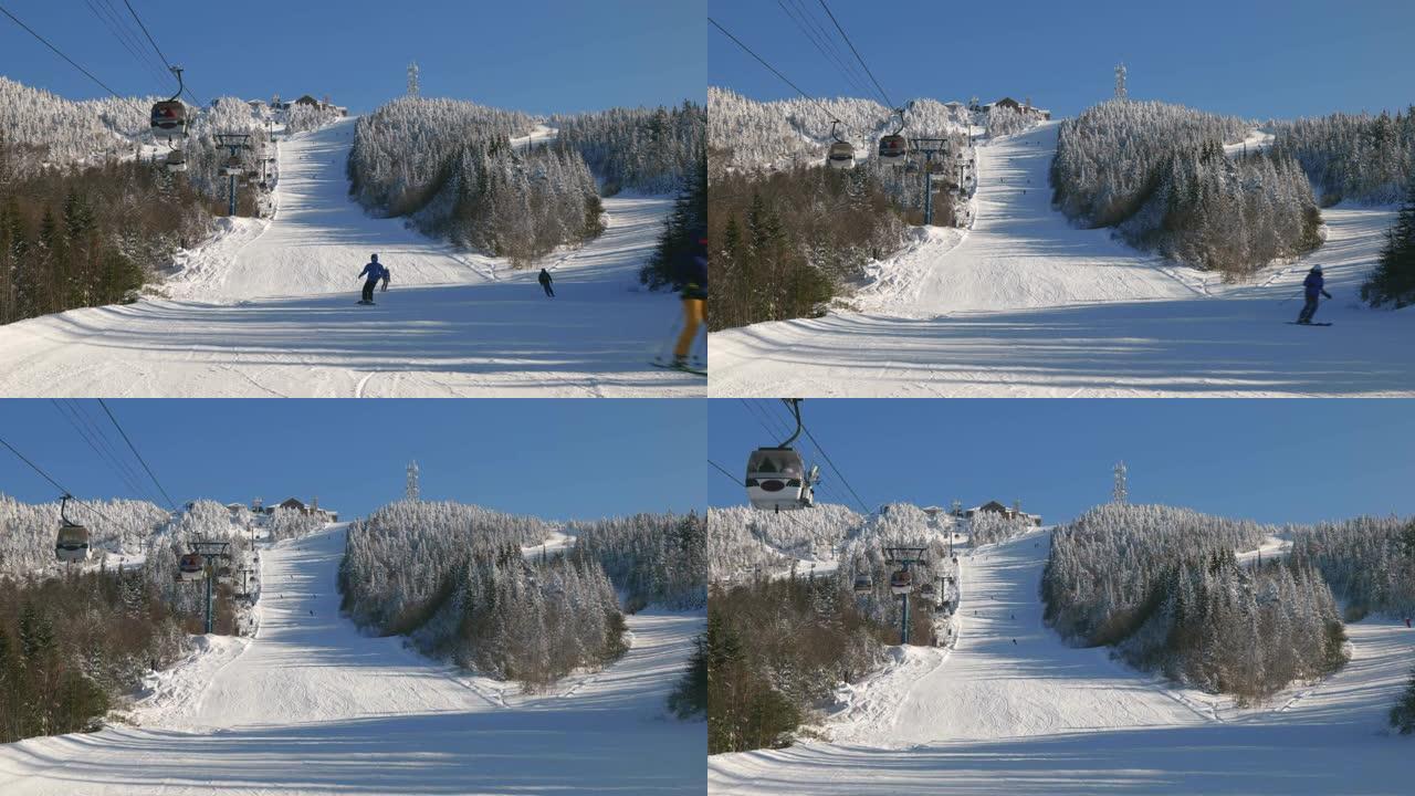 雪山缆车视图，滑雪坡上方的缆车