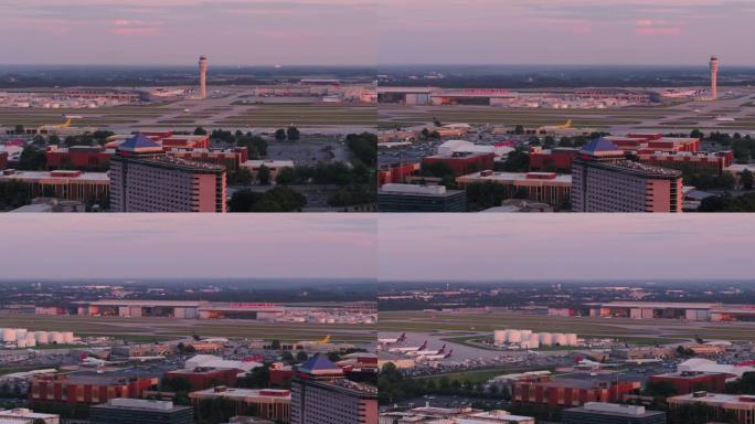 亚特兰大航空v290特写镜头在日落时分在哈茨菲尔德-杰克逊机场上空低空飞行