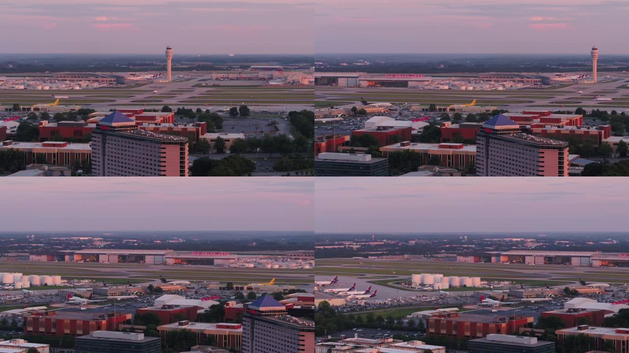 亚特兰大航空v290特写镜头在日落时分在哈茨菲尔德-杰克逊机场上空低空飞行
