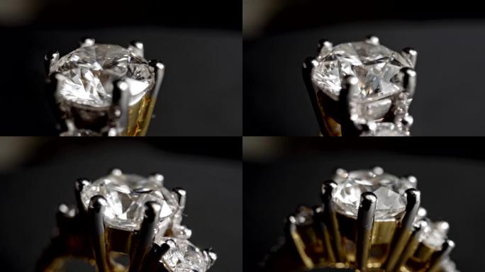钻石戒指的极端细节在黑暗背景上旋转时特写镜头
