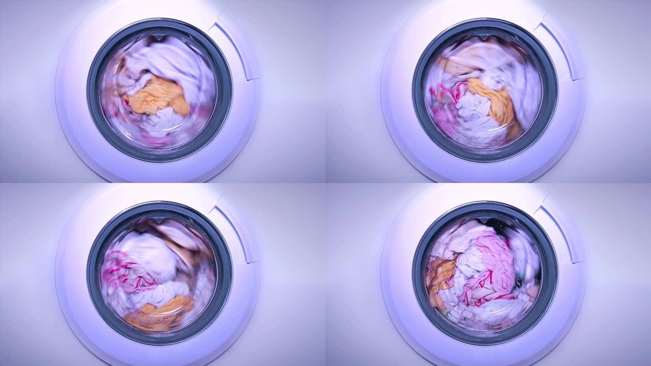白色洗衣机洗衣服滚筒旋转翻滚家庭生活特写