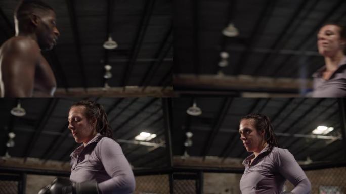 女子MMA战士在八角形中击掌她的男教练