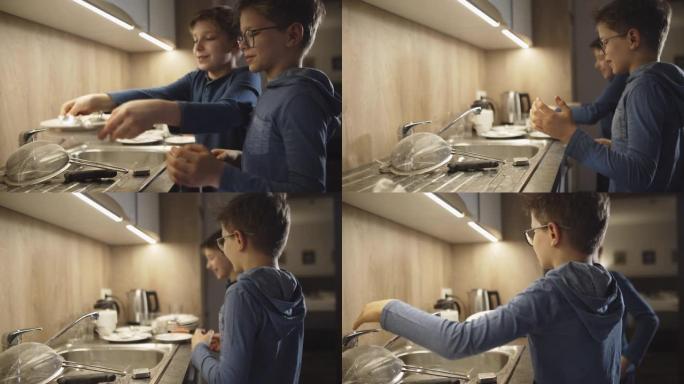 小男孩在家洗碗洗盘子小男孩厨房
