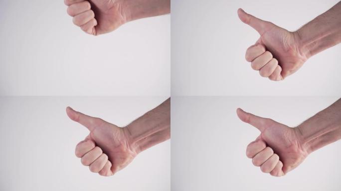 一个年轻人将手指放在一起，在白色背景上展示了一个类似的标志。国际手语