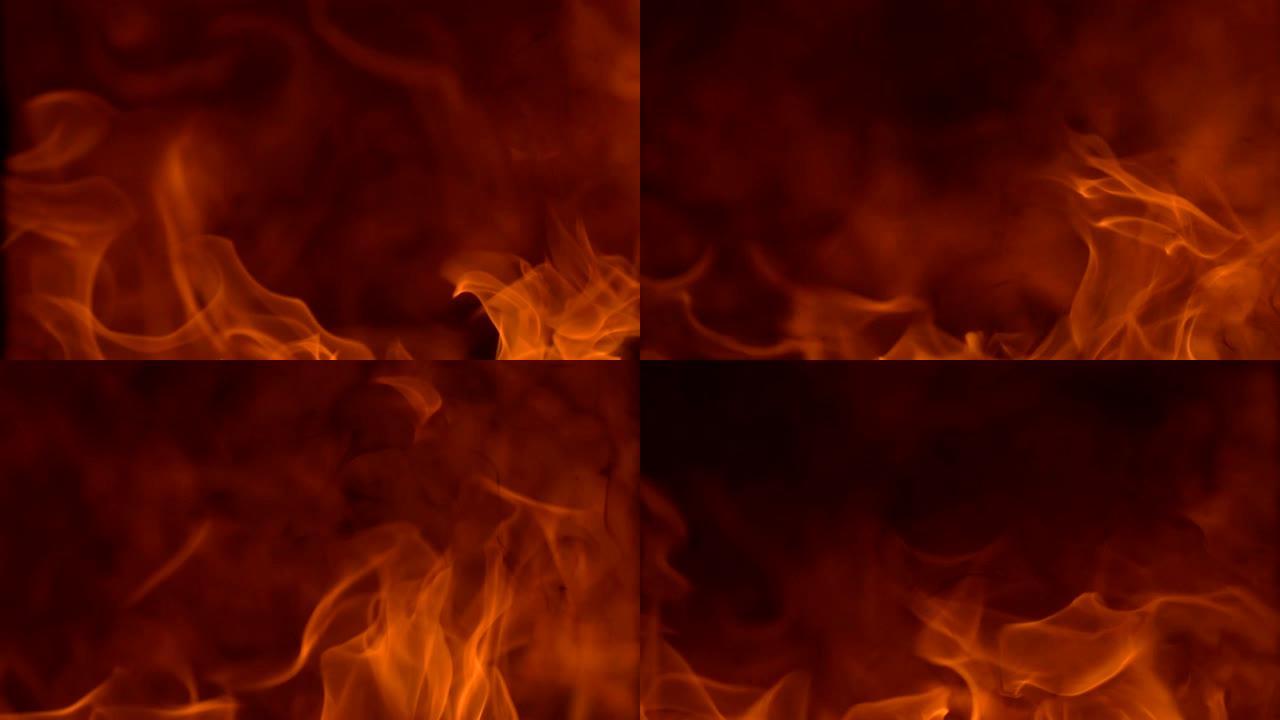 慢动作火焰在黑暗背景上燃烧发光，红色热火焰在黑暗屏幕上的全火焰上运动，危险的热火焰爆炸，用于图形创意