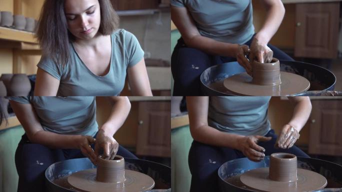 女性陶器手在工作。