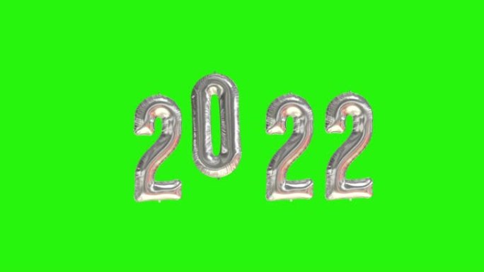 新2020年庆典。绿色背景上的银箔气球数字2020