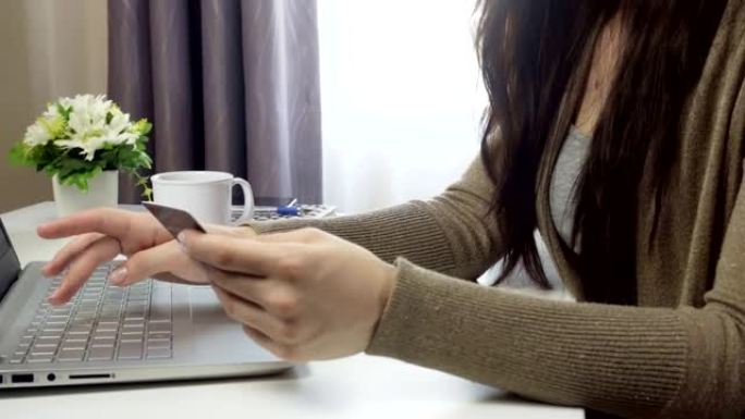 Young woman booking travel ticket in online store 