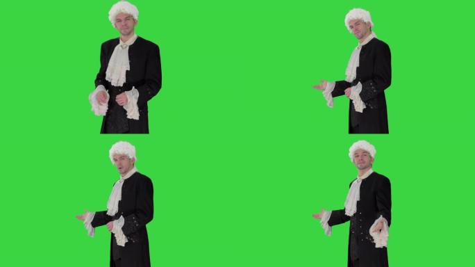 穿着18世纪吊带背心和假发的人在绿色屏幕上做着欢迎的手势，色键