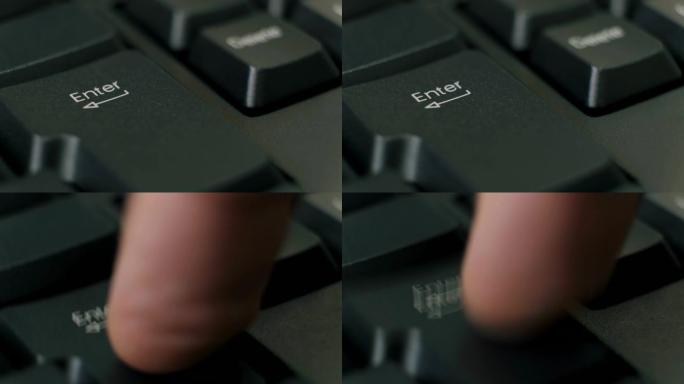 人的手指反复按下黑色键盘上的回车键。