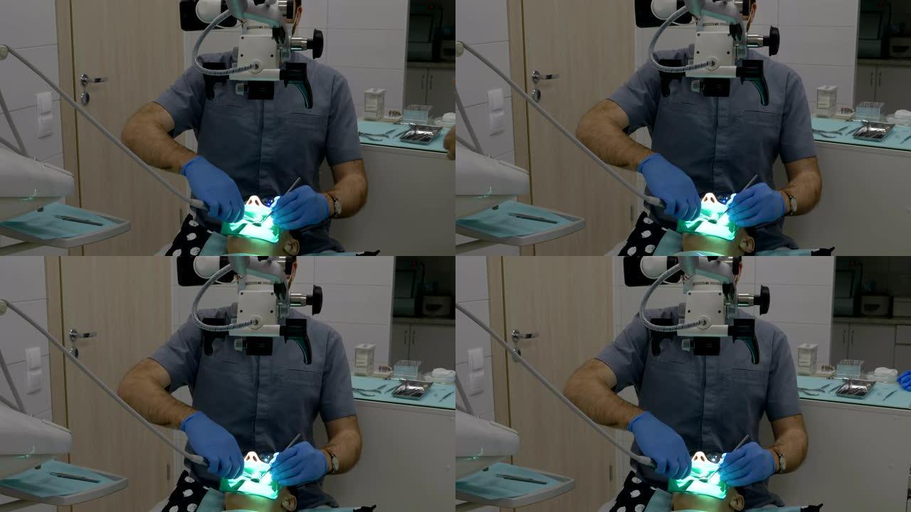 专业牙科医生用钻头和镜子操作