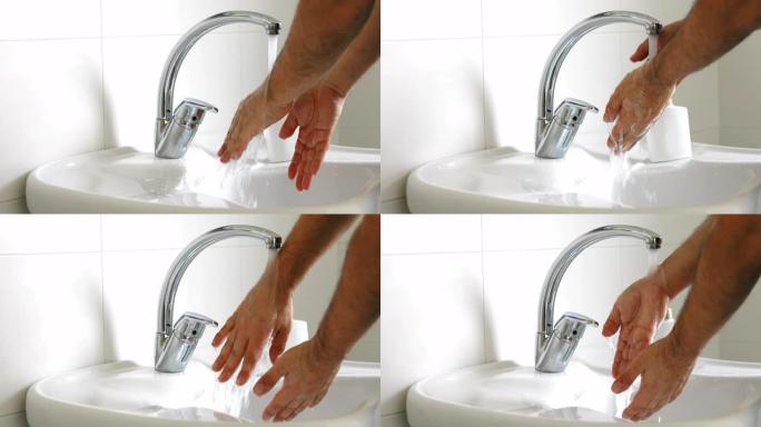 男性手起泡并洗净以避免感染
