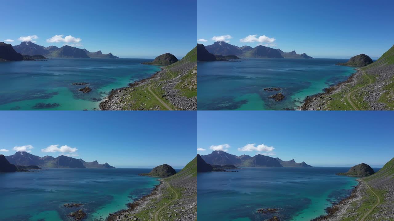 鸟瞰图。飞越大海，从豪克兰海滩和曼南峰欣赏弗莱克斯塔杜亚。挪威罗弗顿群岛