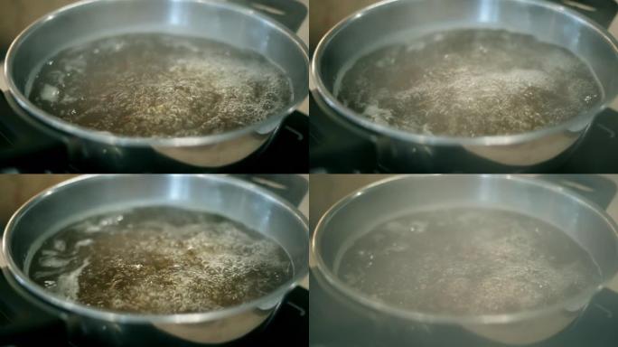 锅里煮热汤特写镜头沸腾冒泡高温温度