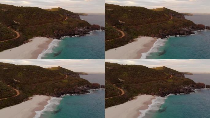 西澳大利亚州奥尔巴尼西角豪国家公园日落时雪莱海滩的无人机镜头。