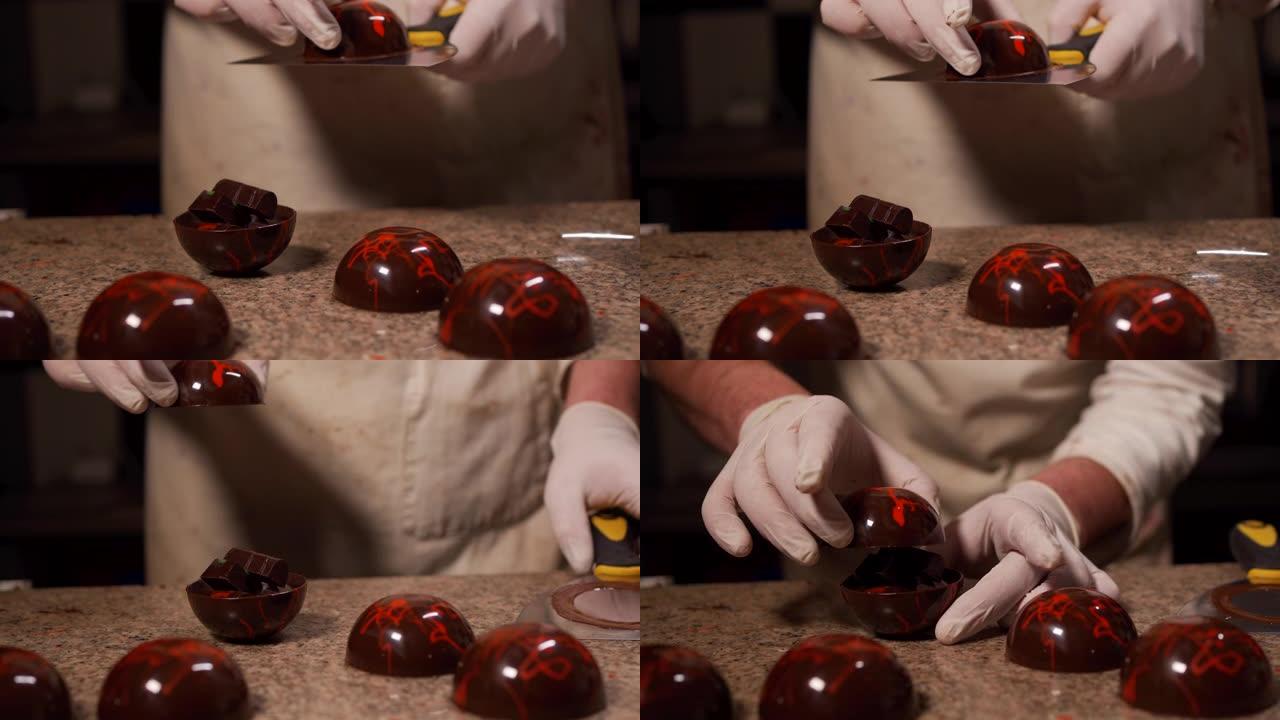 熟练的糕点面包师制作装饰巧克力球