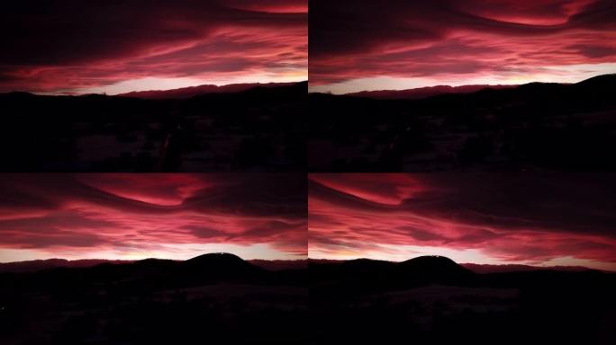 冬季山区戏剧性的红色日落