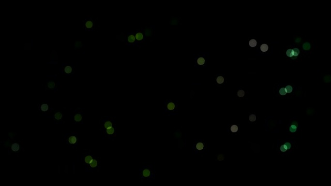 黑屏动画上的Bokeh灯。高清镜头。绿色博克。抽象的波克背景。