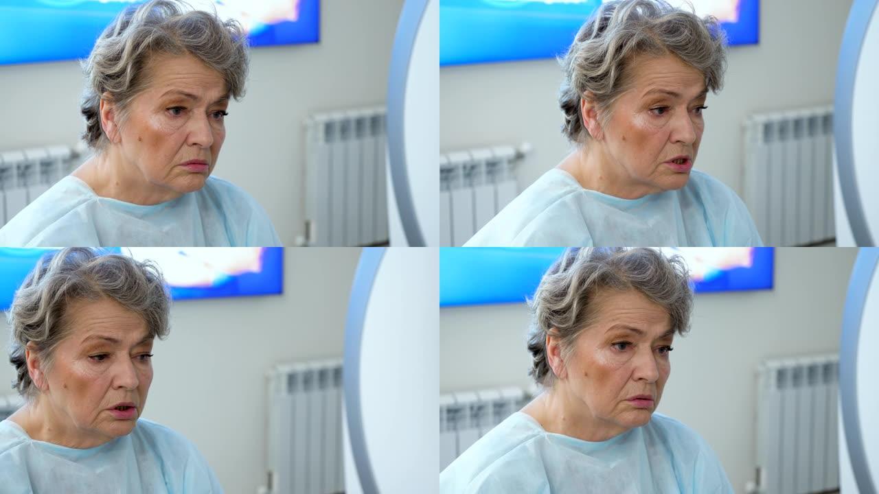 老年女性患者在CT或MRI扫描过程中与医生交谈的特写镜头。老年迷人的女人在体检。4K