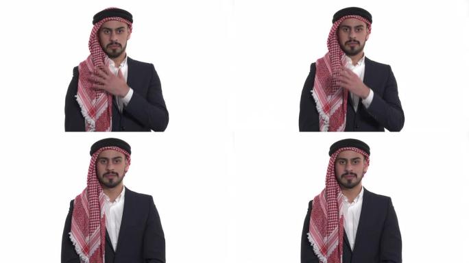 沙特阿拉伯男子keffiyeh的特写镜头表达了休克的反应。肢体语言概念。孤立，在白色背景上