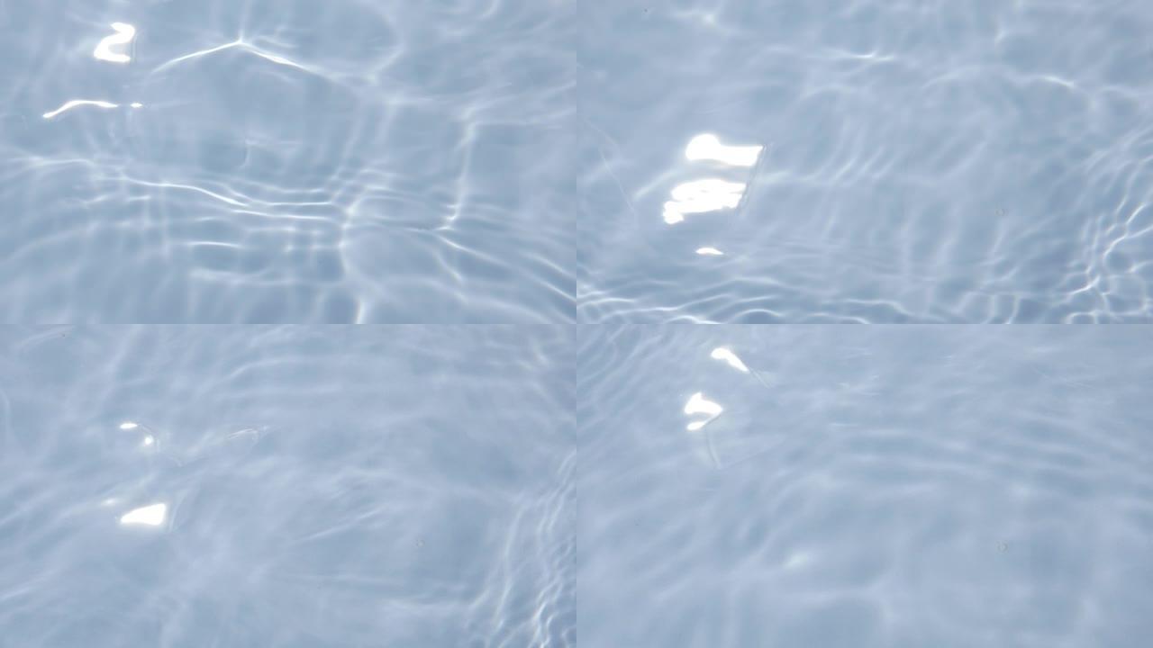 光在透明表面上的反射，如池底慢镜头
