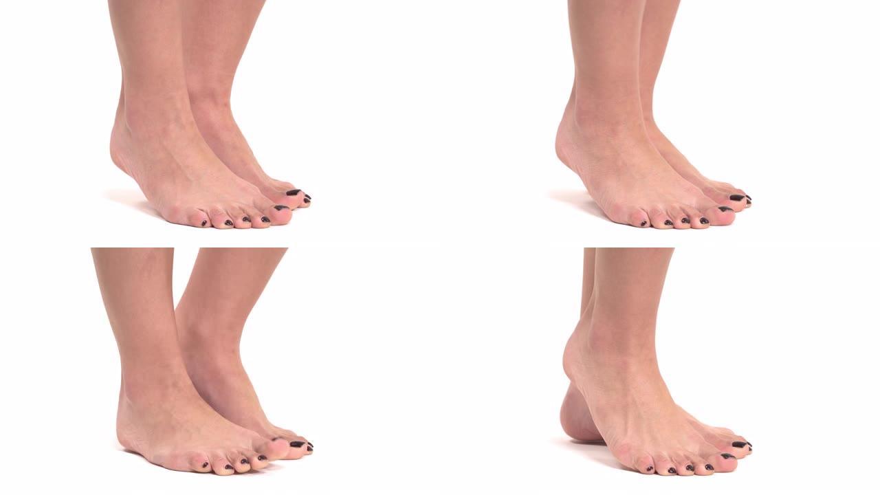 苗条的女性脚的侧视图，时尚的黑色修脚站在脚趾上。孤立，在白色背景上