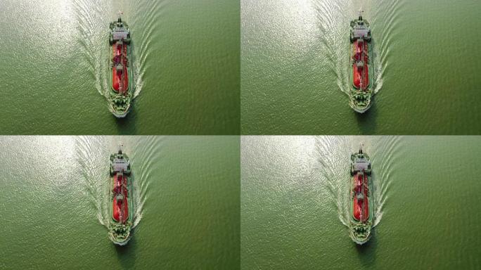空中前视油船油轮全速，具有美丽的波浪图案，用于运输或能源概念背景。