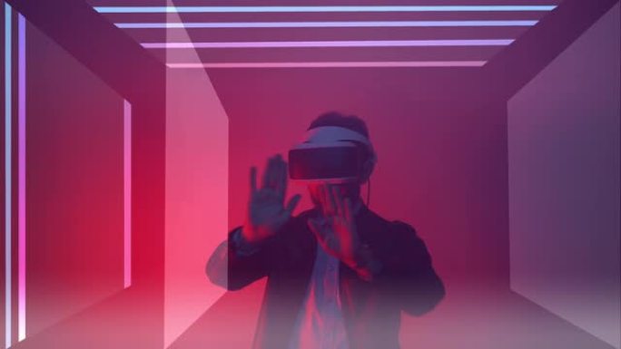 带有传感器显示的眼镜中虚拟现实的未来视觉，增强现实中的人手势。带有虚拟现实耳机、抽象动作和手势的交互