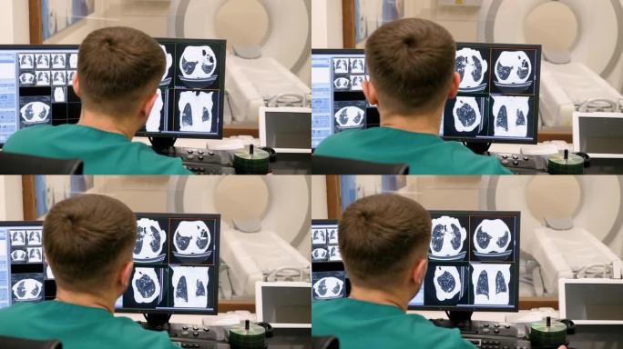 放射科医生在控制室中观察有肺部活动的监视器。4K