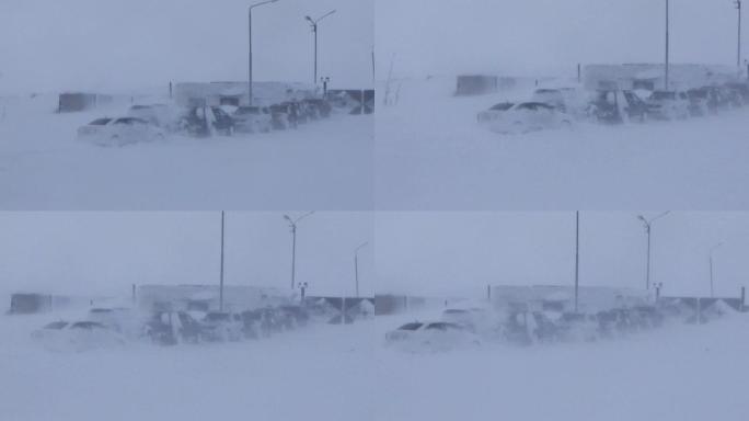 暴风雪席卷了汽车的停车场