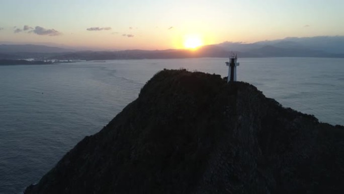 基隆岛灯塔海平面日落夕阳景色