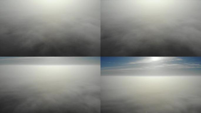 飞越云层。清晨由无人机拍摄的视频。城市上空的烟雾。实时镜头。4K