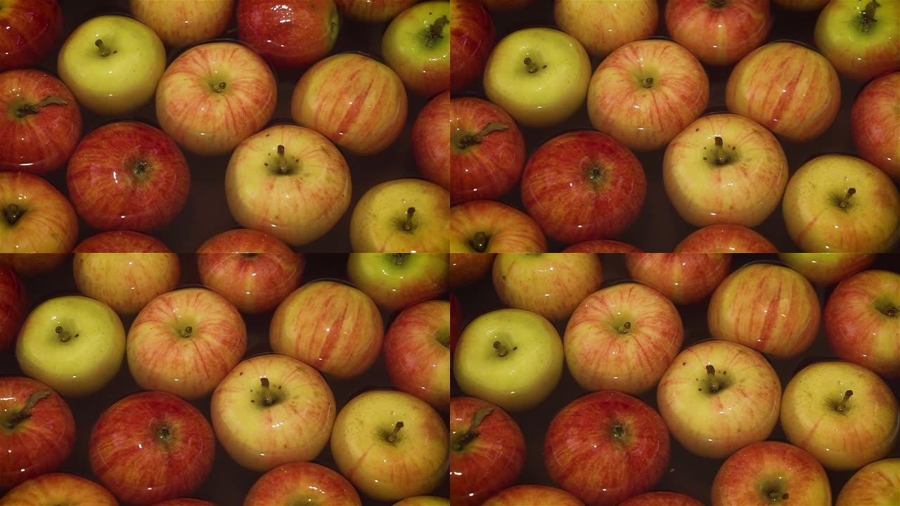 在获得close的维生素汁之前在植物中清洗红苹果的过程