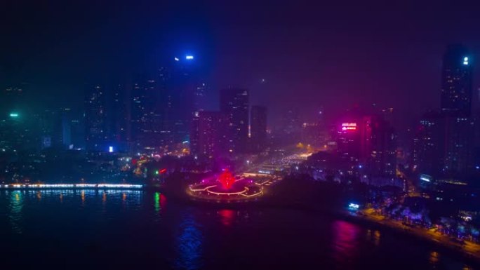 青岛市著名滨水湾夜景照明展纪念碑广场空中全景延时全景4k中国