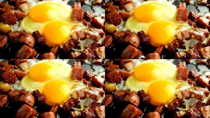 煎蛋或煎蛋卷，切成丁，酥脆，培根香肠在热脂肪中油炸。