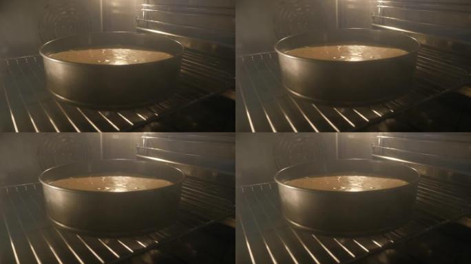 甜点锅在油腻的电烤箱中加热，缓慢倾斜4K